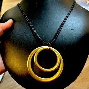 Beautiful Vintage black rope with three strings with a stunning Gold pendant